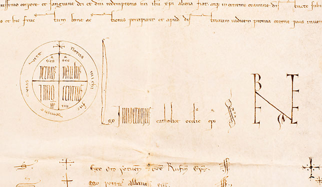 A detail of the papal bull acquired by UBC, which features the signatures of the Pope and 13 cardinals.