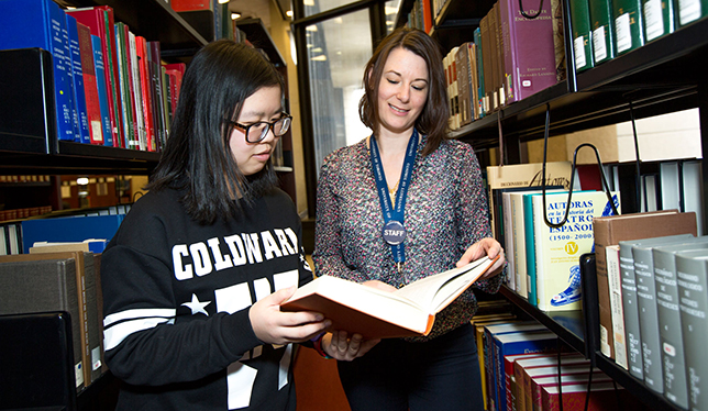 Student engagement librarian Heather Buchansky helps a student. Photo courtesy of the University of Toronto.