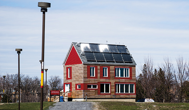 It might look like an ordinary farmhouse, but the CHEeR house at Carleton University is an endlessly adaptable experiment in unconventional energy-saving concepts and technology for the single-family home. Photo by Luther Caverly.