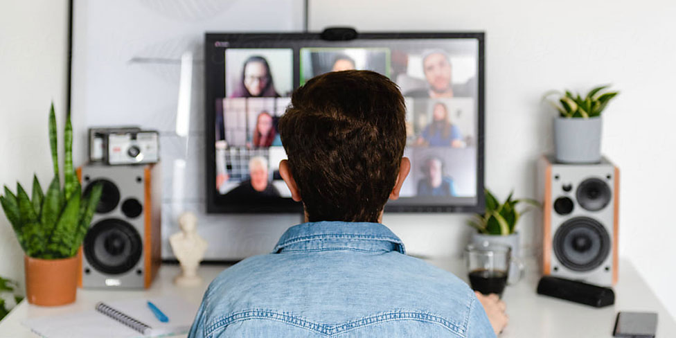 boy attending virtual meeting