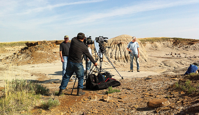 Paleobiologist Philip Currie of the University of Alberta records a segment for the university’s Dino 101 MOOC at Dinosaur Provincial Park in 2013.  Photo courtesy of University of Alberta