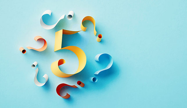 Number five surrounded by question marks