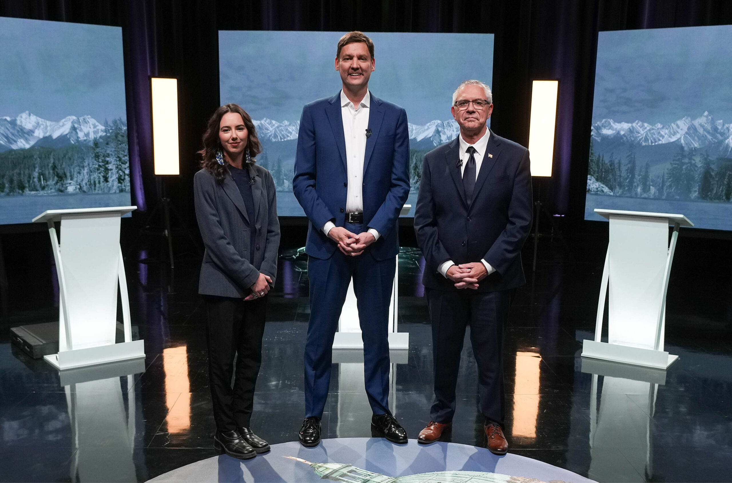 B.C. Green Party Leader Emily Lowan, NDP Leader David Eby and Conservative interim Leader Lorne Doerkson pose before the televised 2026 B.C. provincial election leaders’ debate in Vancouver.